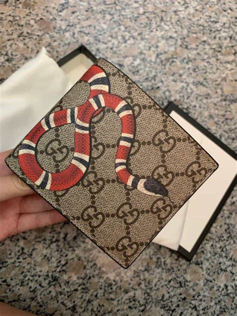 best gucci mens wallet replica|authentic gucci snake wallet.